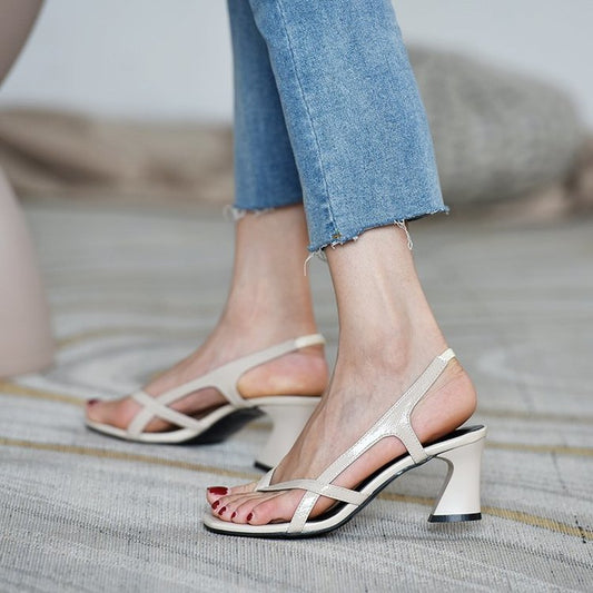 Woman with thick heel and high heel and toe sandals